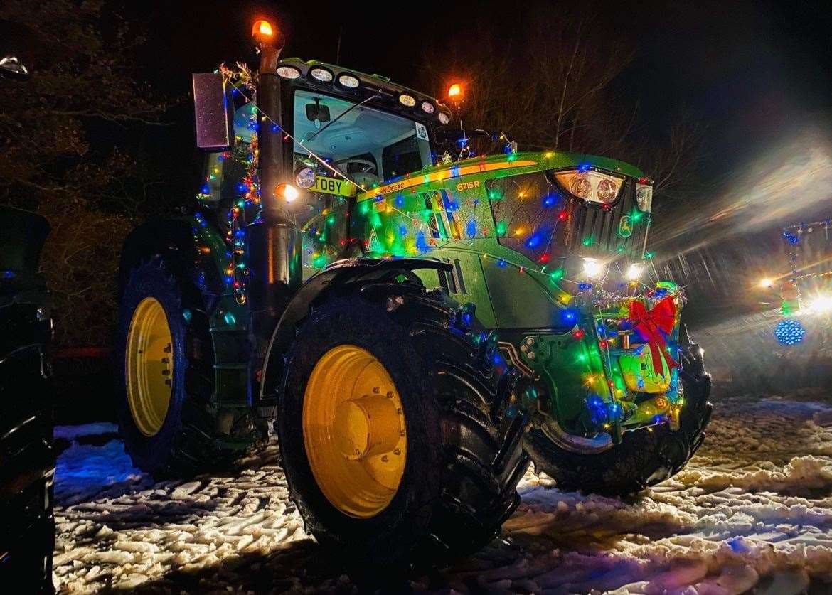 Tractor decorated in christmas lights